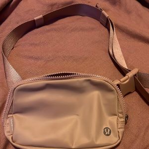 Pink Lululemon belt bag